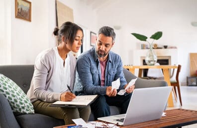 A couple going over their financial documents.