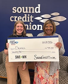 Image of Desiree accepting your Save to Win prize