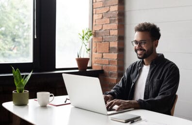 A young man working on his laptop