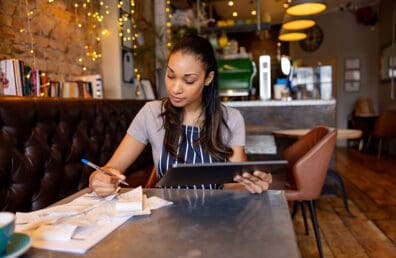 A young business owner bookkeeping.