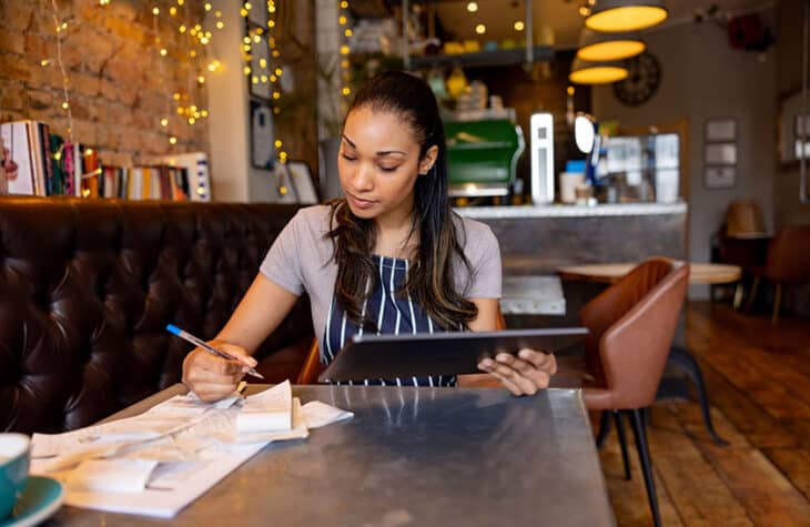 A young business owner bookkeeping.