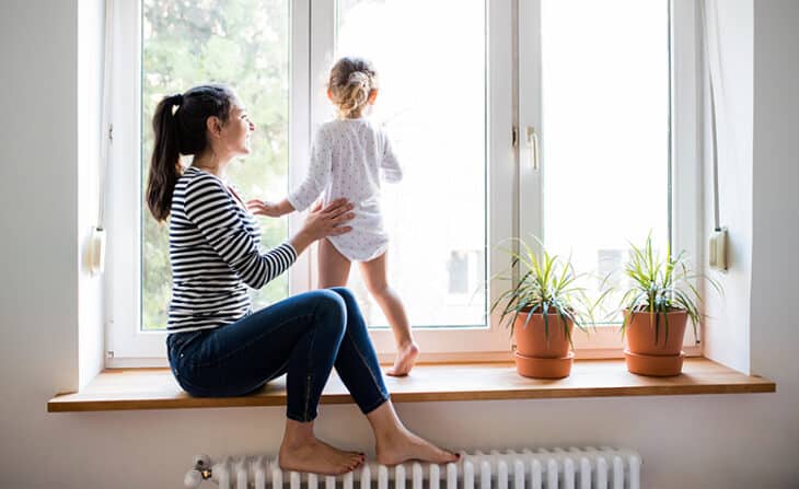 mother and child in window